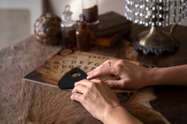 High angle hands using ouija board