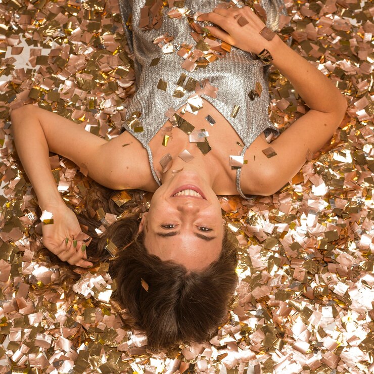 Free Photo high angle of happy woman celebrating new year