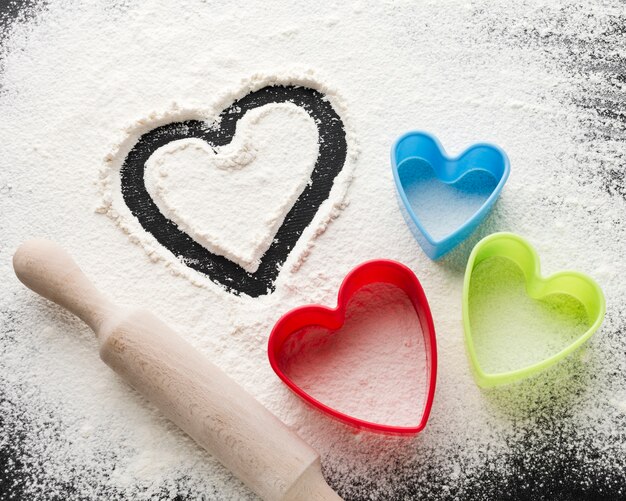 High angle of heart shapes and rolling pin