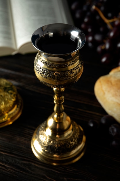 Free photo high angle holy communion with wine chalice