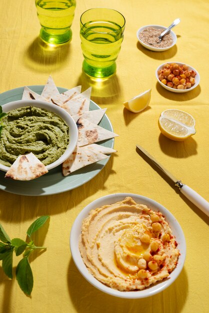 High angle hummus and chickpeas arrangement