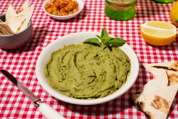 High angle hummus and lemon arrangement