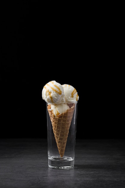 High angle ice cream on cone served in glass