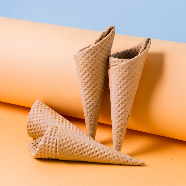 High angle ice cream cones on table