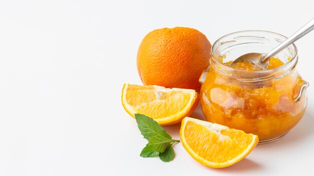 High angle jar with orange jam