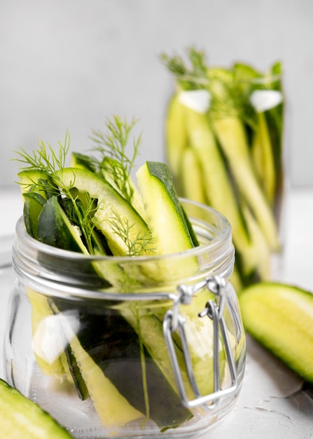 High angle jars with cucumbers