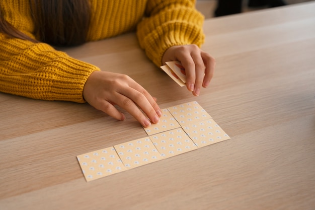 High angle kid playing memory game