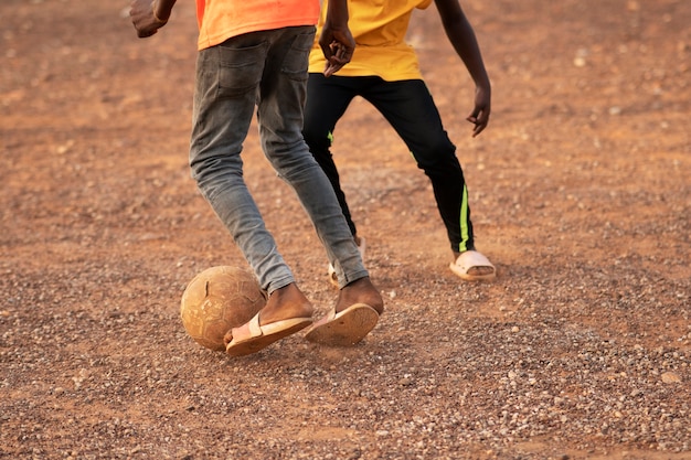 High angle kids playing with ball