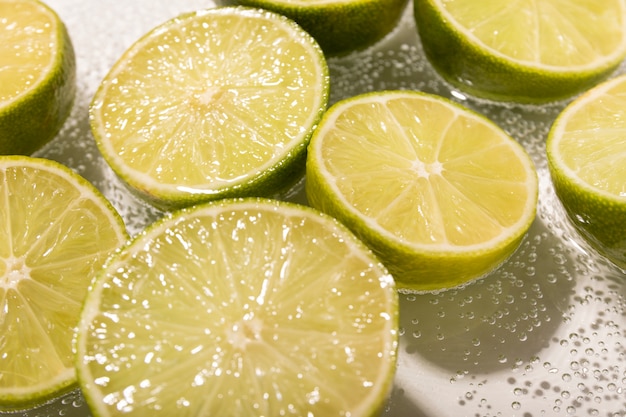 High angle lime and sparkling water