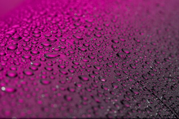 Free photo high angle of liquid drops on surface