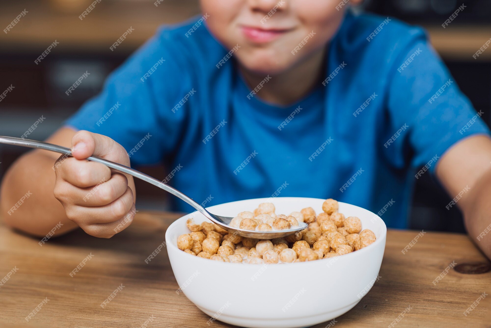 group of kids eating cereal