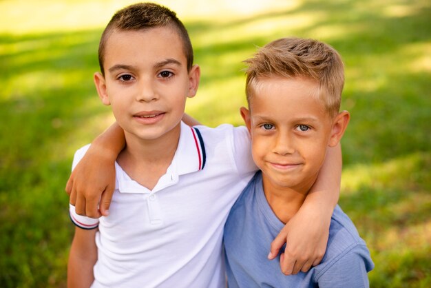 High angle little boys looking at camera