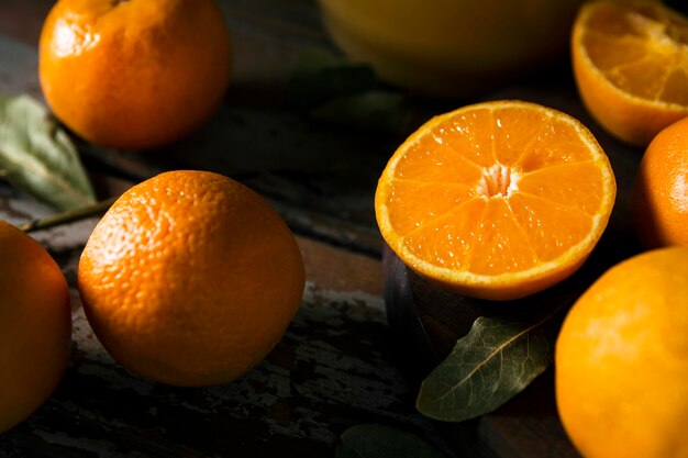 High angle of lots of autumn oranges with leaves