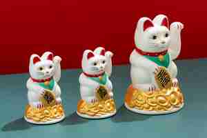 Free photo high angle lucky cats assortment
