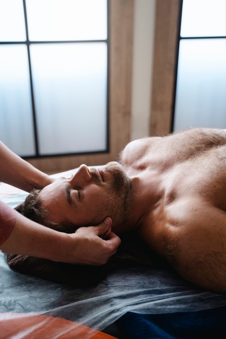 Free Photo high angle man getting massage