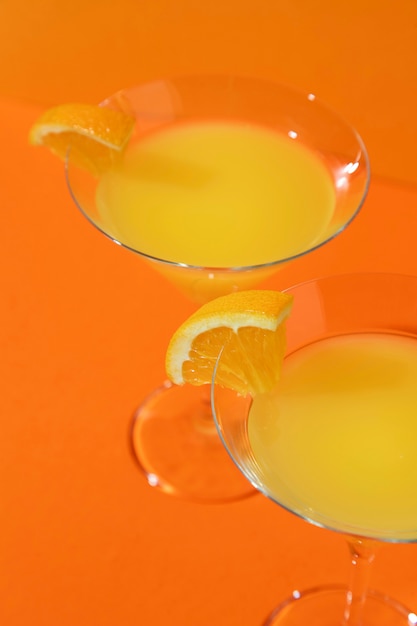 High angle mimosa cocktails with orange slices