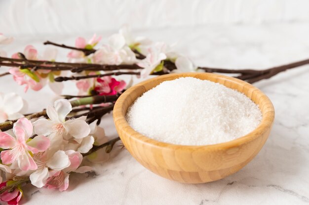 High angle mineral salt with flower beside