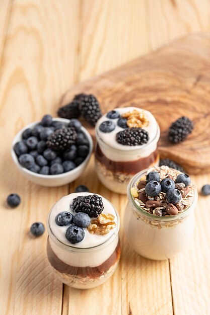 High angle mix of yogurt with berries and oats