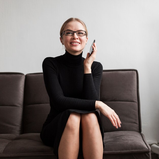 High angle modern woman talking at phone