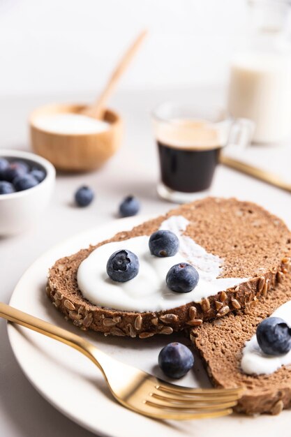 High angle of morning toast with blueberries