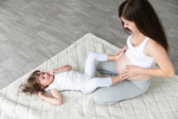 High angle mother and daughter playing