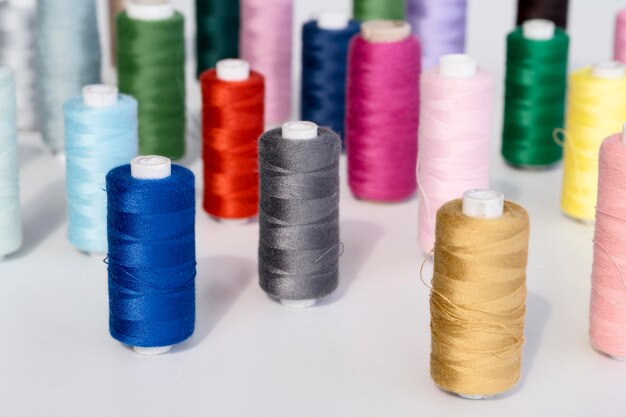 High angle of multicolored thread rolls