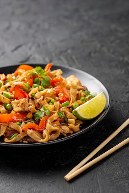 High angle noodles with vegetables and chicken