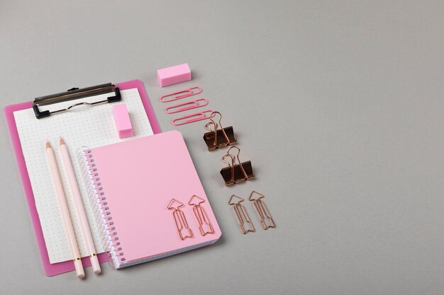 High angle notebook and pencils arrangement