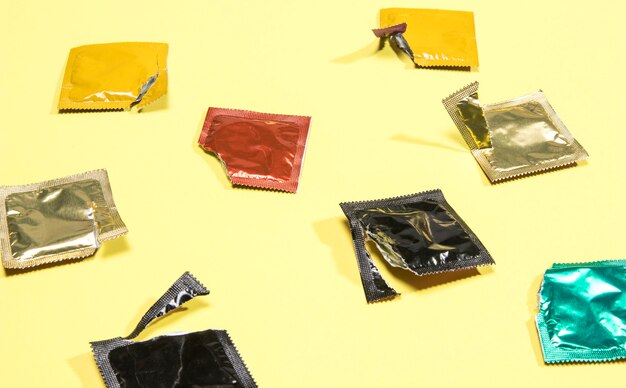 High angle opened condoms wrappers