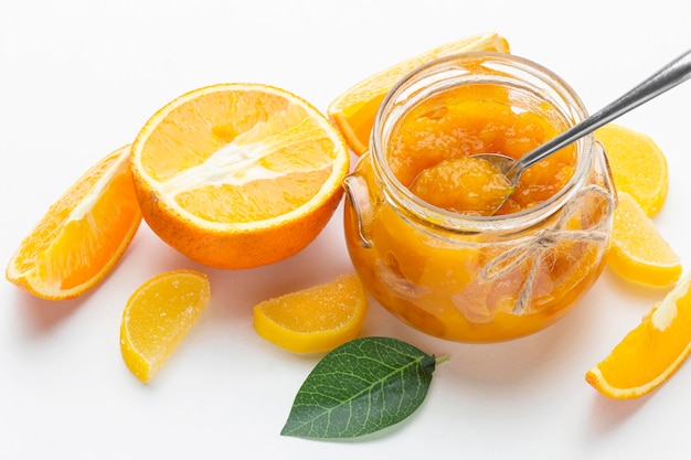 Free photo high angle orange jam in jar