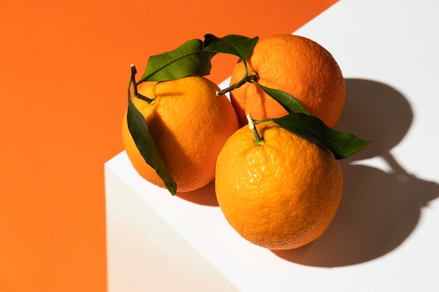 High angle of oranges on podium