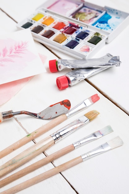 high angle of painting essentials with palette