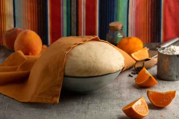 Free photo high angle of pan de muerto dough