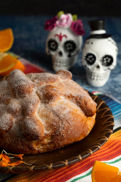 High angle of pan de muerto with skulls