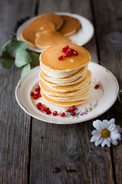 High angle pancake tower with pomegranate seeds