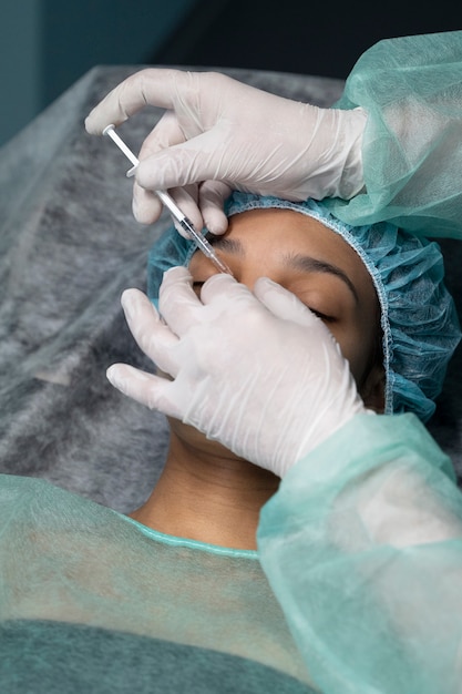 Free photo high angle patient getting anesthesia