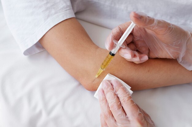 High angle patient getting elbow prp treatment