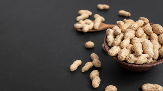 High angle on peanuts in bowl with copy space