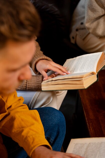 High angle people holding books