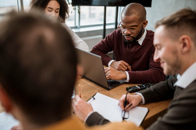 High angle of people in the office during a meeting