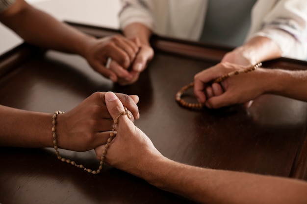 high-angle-people-praying-together_23-2150755532.jpg