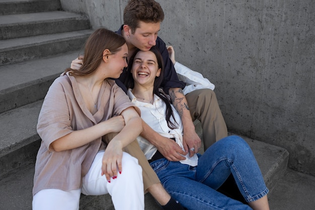 High angle people sitting on stairs