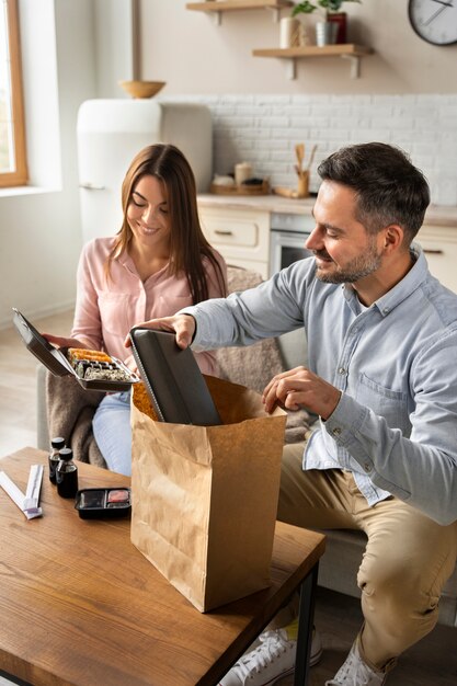 High angle people with sushi order