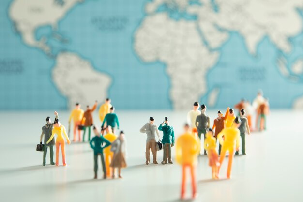 High angle people and world map
