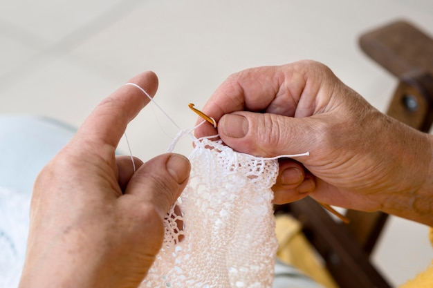 High angle of person crocheting