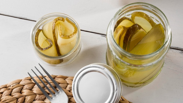 High angle of pickled cucumbers in jars