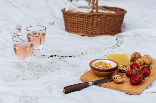 High angle picnic on white sheet