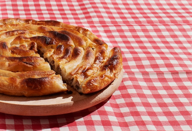 High angle pie on wooden board