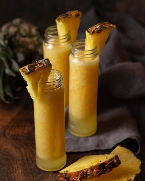 High angle pineapple juice in bottles