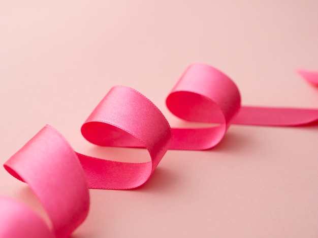 Free photo high angle pink ribbon awareness concept